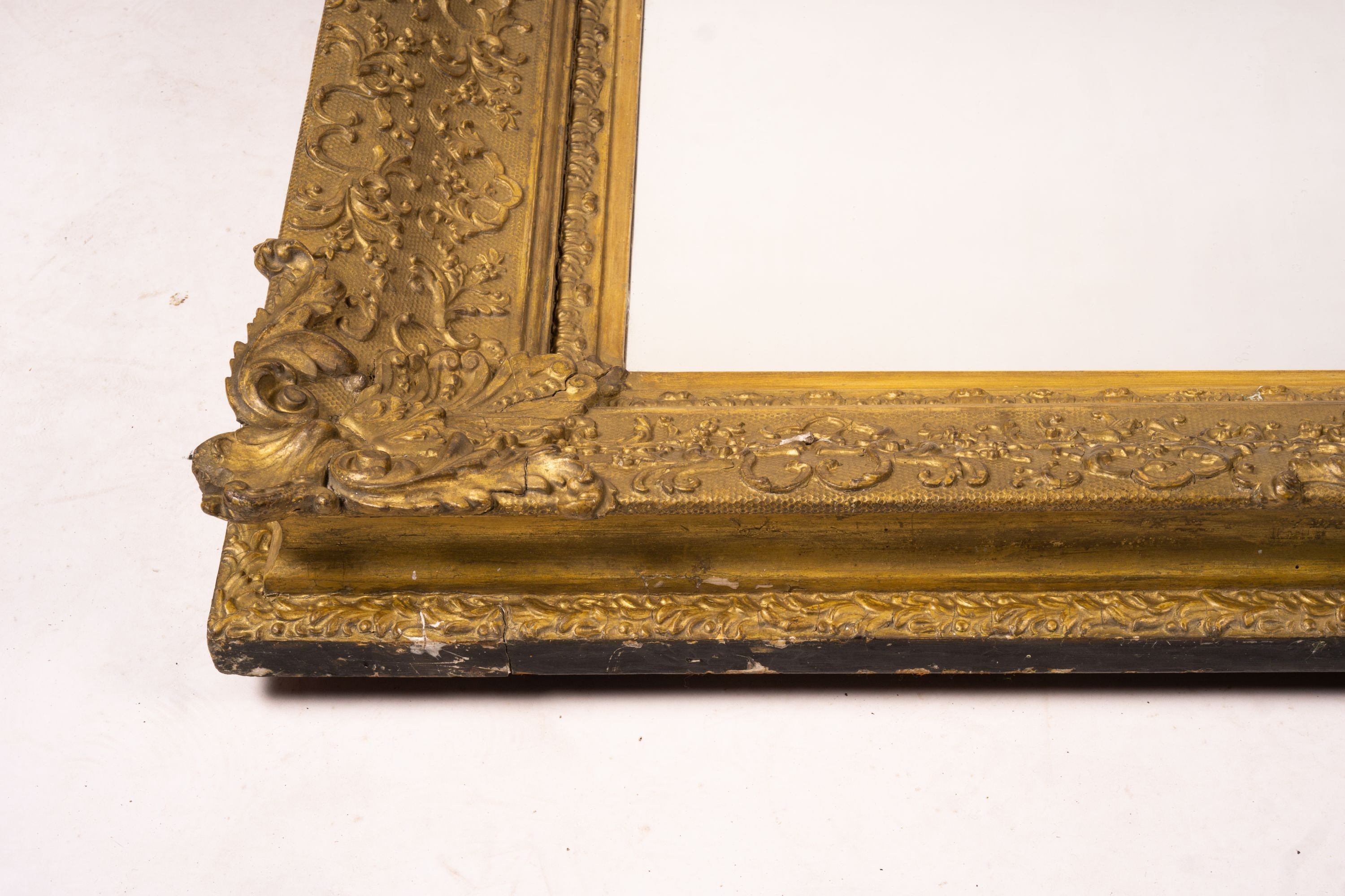 A Victorian gilt gesso wall mirror, W.104cm H.124cm